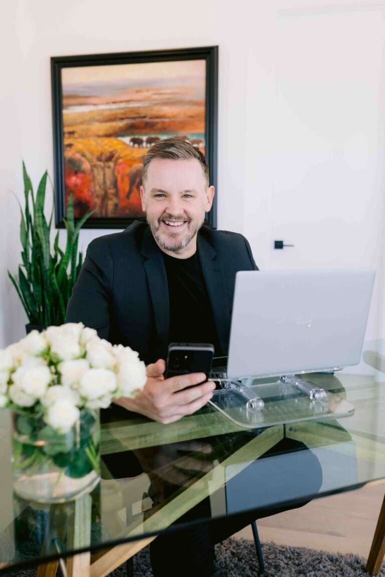Timothy Powles at a desk