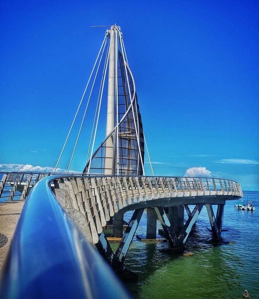 Los Muertos Pier and its sail-shaped mast